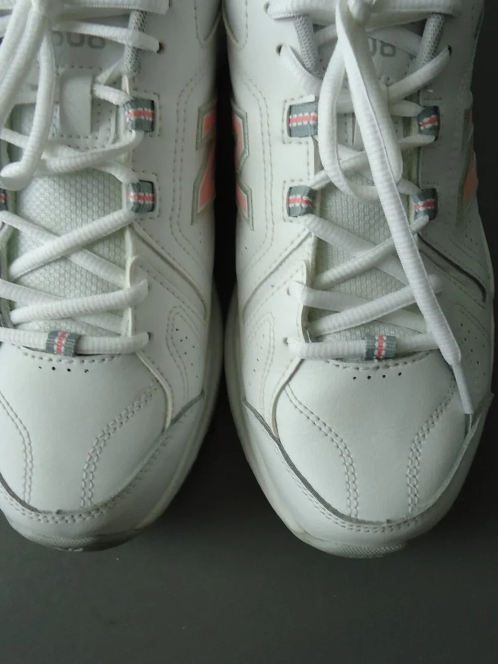 SIZE 9.5. D. New Balance women's white leather sneakers shoes.
